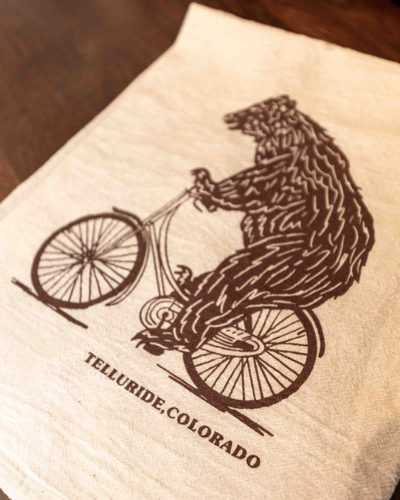 Biking Bear Montana Dish Towel